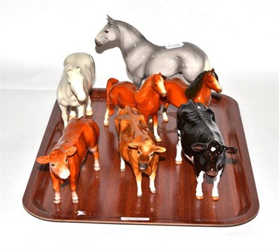 Lot 46 - John Beswick animal figurines comprising: two cows, one bull and four horses (7)