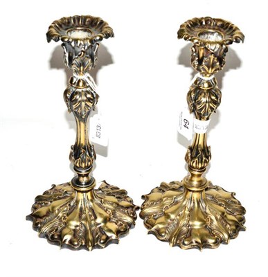 Lot 64 - A pair of silver plated candlesticks, Elkington &amp; Co