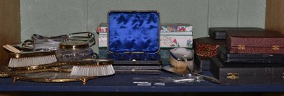 Lot 90 - A silver mounted dressing hand mirror and brush, two cased sets of six silver teaspoons, five other