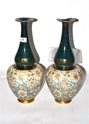 Lot 95 - A pair of Doulton Lambeth vases (one a.f.)