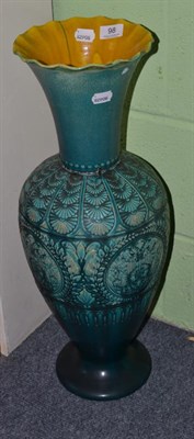 Lot 98 - A large Linthorpe Baluster vase, turquoise ground, relief floral panels, footed base, old repair to