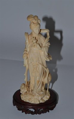 Lot 107 - An early 20th century carved ivory figure