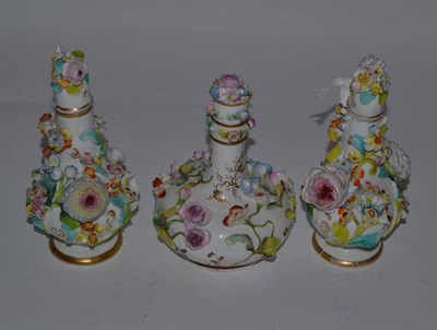 Lot 109 - A pair of 19th century floral encrusted porcelain bottles and another (3)