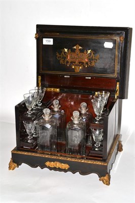 Lot 159 - A 19th century walnut and brass inlaid ebony table top drinks cabinet