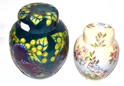 Lot 165 - A William John Moorcroft Finches pattern ginger jar and cover, designed by Sally Tuffin, on a green