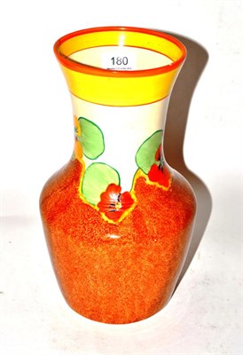 Lot 180 - A Clarice Cliff Nasturtium pattern vase, printed factory marks, 30cm (cracked)