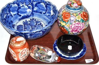 Lot 186 - A small group of Oriental ceramics including large scent bottle, blue and white bowl etc