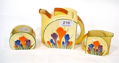 Lot 216 - A Clarice Cliff Bizarre Crocus pattern Stamford tea set, comprising teapot and cover, milk jug...