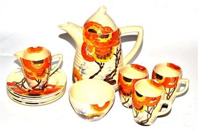 Lot 225 - A Clarice Cliff Bizarre Rhodanthe pattern Lynton coffee set, comprising coffee pot and cover, three