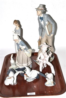 Lot 263 - Five various Lladro figures including artist, with a Nao figure and another (7)