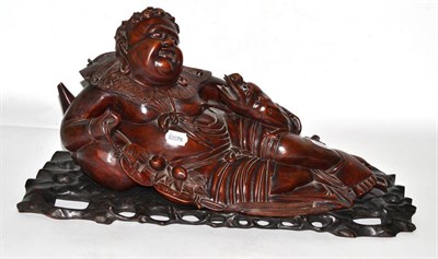 Lot 266 - A large 20th century carved wood Chinese figure of Lui Hai, with stand