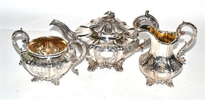 Lot 267 - A silver three piece tea service