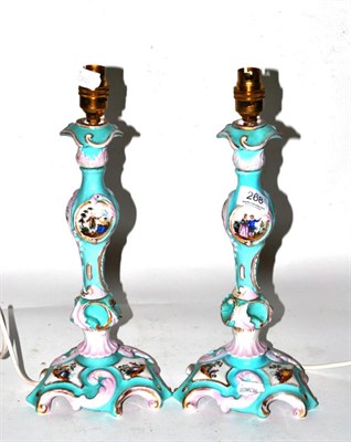 Lot 268 - Pair of German porcelain candlesticks, fitted for electric light