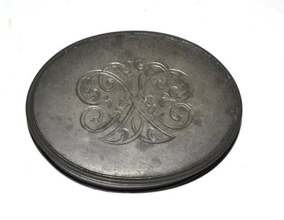 Lot 281 - An early 18th century pewter oval snuff box and cover, dated August 14 1739