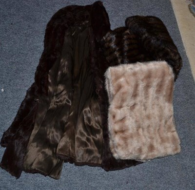 Lot 315 - A brown mink jacket, an early 20th century brown striped fur stole and a cream faux fur stole