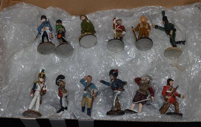 Lot 321 - A collection of one hundred Diecast military figures with three glazed display cases