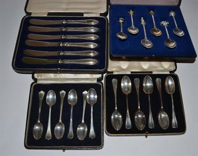 Lot 378 - Two cased sets of silver teaspoons, a set of tea knives and a set of jubilee commemorative spoons