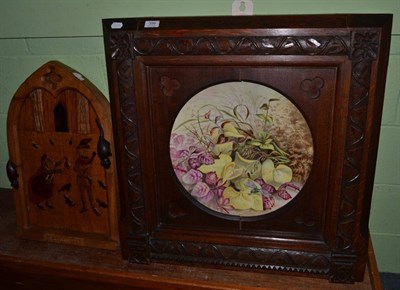 Lot 399 - A carved wooden panel depicting the Pied Piper, another of the Last Supper and a Derby floral...