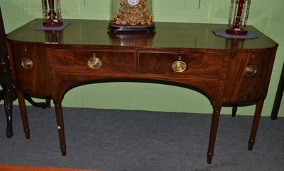 Lot 436 - A George III mahogany breakfront sideboard