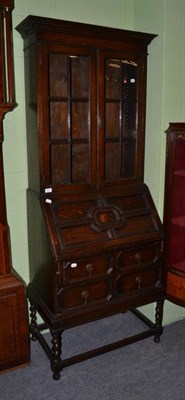 Lot 441 - An oak bureau bookcase