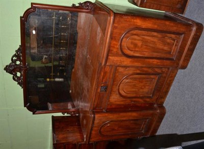 Lot 443 - A Victorian carved mahogany inverted break front mirror back sideboard