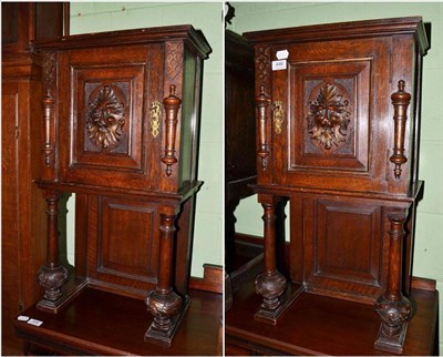 Lot 446 - A pair of oak bedside cupboards (adapted)