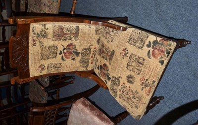 Lot 482 - A early 20th century oak chair with tapestry style upholstery