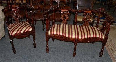 Lot 489 - A reproduction Chinese loving seat and corner seat