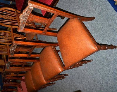 Lot 493 - A set of four Edwardian dining chairs with leatherette seats