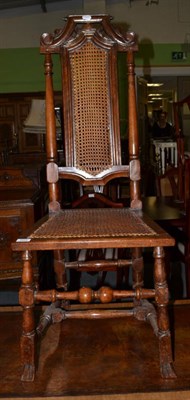 Lot 503 - A walnut cane chair