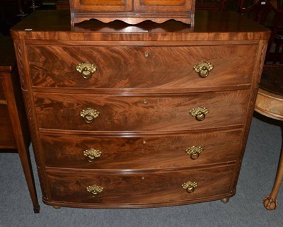 Lot 504 - A George IV mahogany bow fronted chest