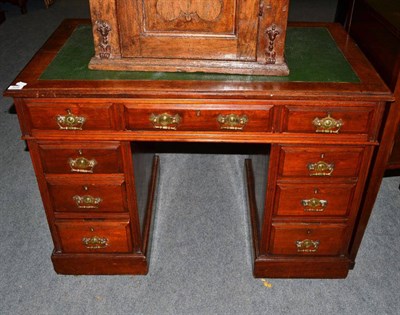 Lot 508 - A late 19th/early 20th century mahogany kneehole desk