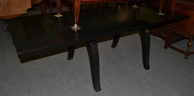 Lot 514 - A 1930's ebonised French extending dining table