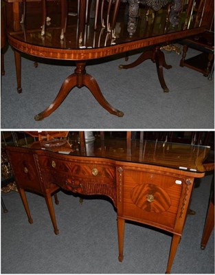 Lot 523 - A Regency style mahogany dining table together with a serpentine sideboard (2)