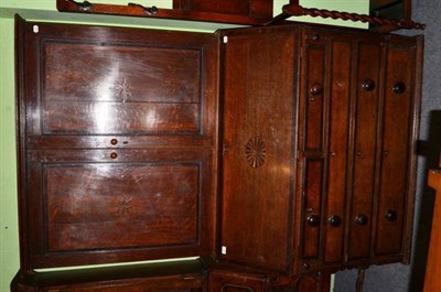 Lot 531 - A Georgian oak bureau bookcase (lacking feet)