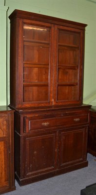 Lot 535 - A late Victorian oak secretaire bookcase