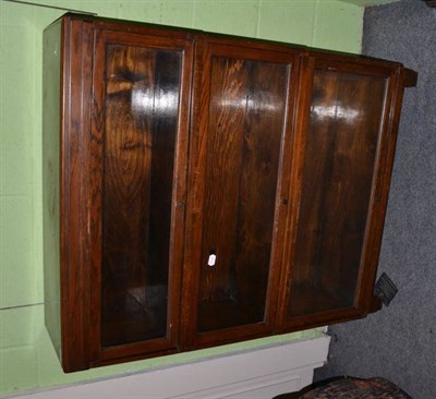 Lot 537 - A three tier Globe Wernicke oak bookcase