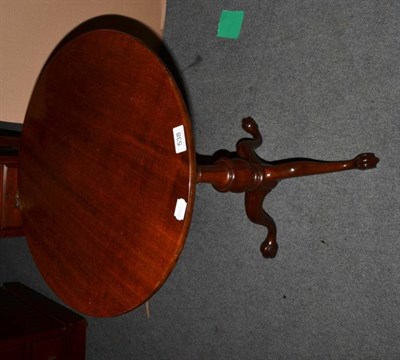 Lot 538 - A 19th century mahogany tripod table