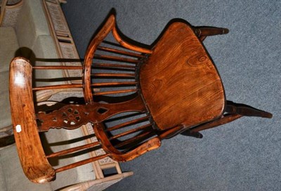 Lot 543 - A 19th century yewwood Windsor chair (splat replaced)