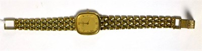 Lot 7 - A lady's 9ct gold wristwatch, signed Tissot