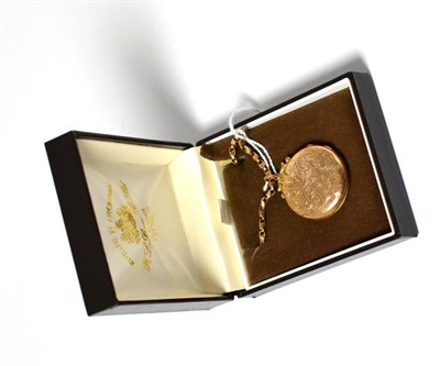 Lot 21 - A 9ct gold engraved locket on chain