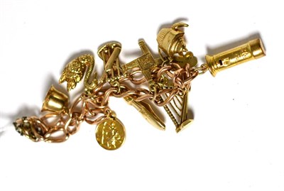 Lot 27 - A curb bracelet hung with ten charms