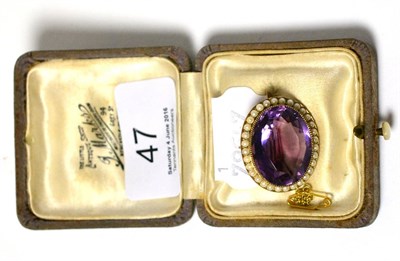 Lot 47 - A Victorian amethyst and seed pearl brooch in a yellow mount
