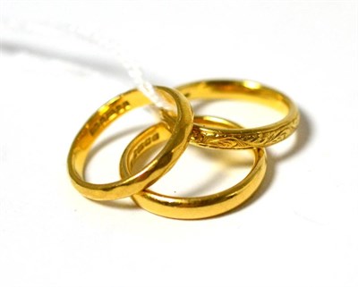 Lot 66 - Three 22ct gold band rings