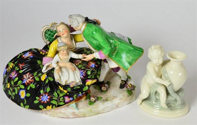 Lot 112 - A late 19th/early 20th century German group and a Victorian tinted parian group (2)