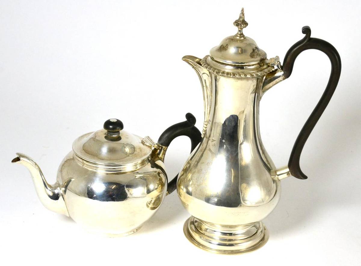 Lot 123 - A silver teapot and a James Dixon & Sons silver hot water jug (2)