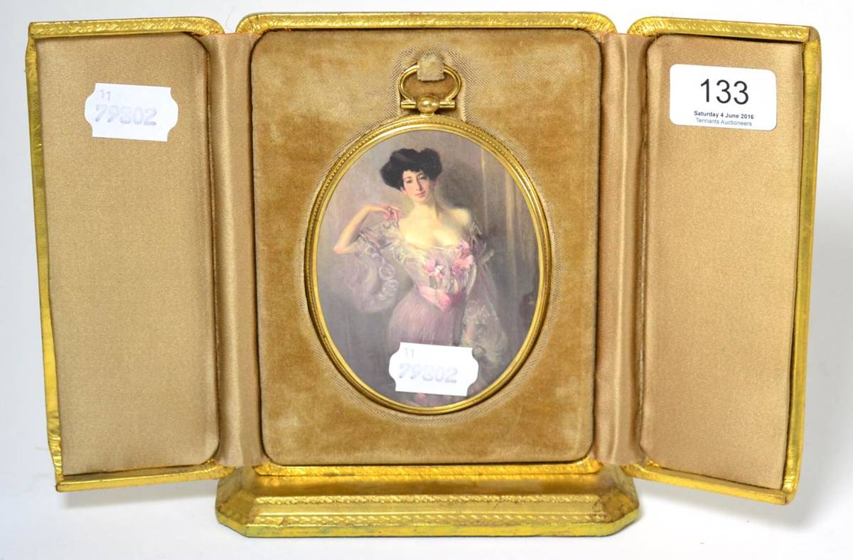 Lot 133 - A late 19th century miniature of a lady, in a tooled gilt case