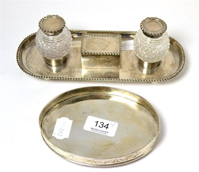 Lot 134 - A silver desk stand, Chester 1897 and a George III silver teapot stand (2)