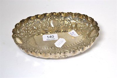 Lot 140 - A silver dish with repoussé decoration, London 1891