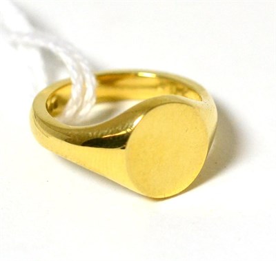 Lot 166 - An 18ct gold signet ring, the plain polished head on integral shank, finger size L1/2